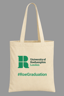 A beige canvas tote bag with long handles, featuring the green University of Roehampton London logo and '#RoeGraduation' text printed on the front, shown against a white background with a faint grid pattern.