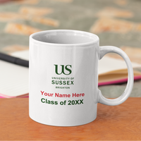 White mug with University of Sussex branding on